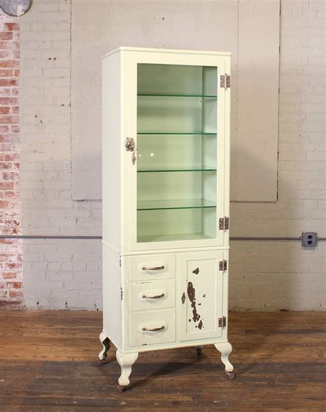 antique steel medical cabinet|antique medical doctors cabinets.